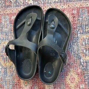 Gizeh leather all black Birkenstocks.